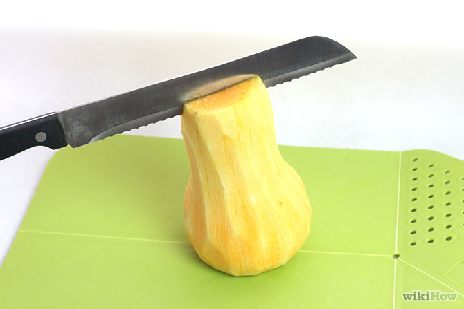 cuchillo de sierra cortar calabaza por la mitad